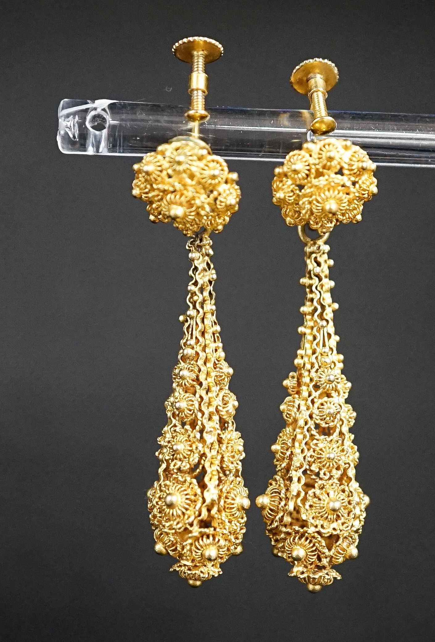 A pair of antique yellow metal filigree cannetile work teardrop shaped earrings, 45mm. 4.6cm.